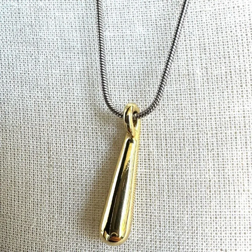 Gold tone pendant necklace